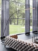 Bogenlampe Lampo von Cattelan, geeignet für die Beleuchtung des Wohnzimmertisches und des Wohnzimmers