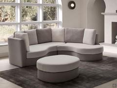 Gebogenes Ecksofa Ravel komplett mit Ottomane