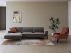 Elegantes Wohnzimmer mit dem modularen Ecksofa Agadir und dem Sessel Mabel aus der gleichen Kollektion