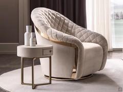 Portofino luxury quilted armchair by Cantori with swivel base
