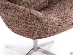 Detail of the seat of Olivia armchair, well showing the detail of the original fabric Dancing Queen