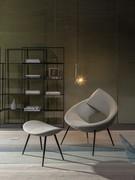 Lock armchair and footrest, ideal in a modern and stylish living room