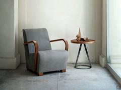 Dallas armchair upholstered in nubuck leather, with Canaletto walnut armrests and feet