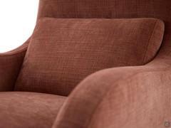 Detail of the backrest cushion, always included and with upholstery to match the armchair