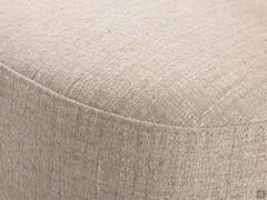 Detail of the upholstered seat, covered in Loto col.13 fabric