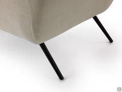 Detail of the conical metal feet, angled to give a slender effect