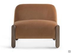 The generous contours of the cushions are delicately supported by the four perimeter feet, which slender the round shapes