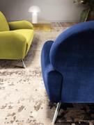 Rear view of the Lune armchair, fully retro-finished, with the 2-seater sofa in the background