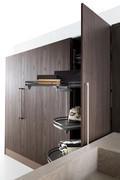 The pull-out storage trays in the corner column cupboard, part of the Oasis L05 laundry unit - (finish not available)
