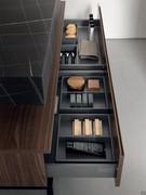 Functional nailhead-opening drawers and interior organizers in orion gray finish