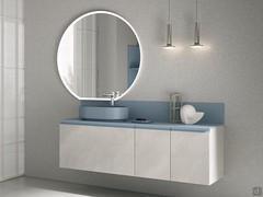 Bathroom cabinet with coloured washbasin and top in Minera-kolor N119 Atlantic, with optional splashback and mirror included
