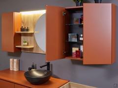 View of the two-door hinged wall unit with push-pull opening: the interior is always fitted with glass shelves