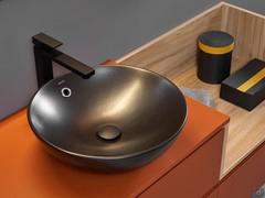 Detail of the allround countertop washbasin model Firenze in matt black ceramic (the washbasin can be detached and replaced with one of the customer's choice)