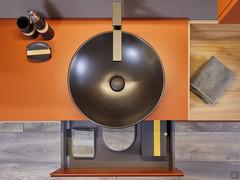 Top view of the countertop allround washbasin model Firenze and the underlying drawer of the washbasin base unit, shaped to accommodate the drain and siphon