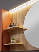 View of the Screen mirror equipped with practical little shelves to match the backrest, additional storage surfaces for toiletries, practical and functional