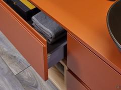 Interior view of wall-hung base units with drawer