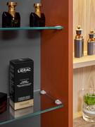 Interior view of hinged door wall units with elegant glass shelves