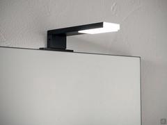 Quadra mirror with black aluminium frame and Ziko spotlight, one of several models available in the configurator