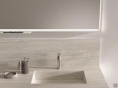In the detail photo we can see the integrated LED lighting under the frame