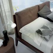 Detail of the headboard with cushions (removable cover)