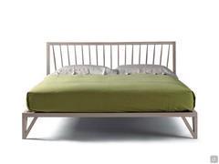 Katai is a slim real wood bed frame in natural grey walnut