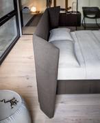 Headboard side wings can be adjusted into several positions