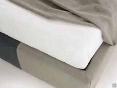 Detail of the stitching on the bed frame for the two-coloured effect