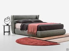 Designer bed with wraparound headboard Destin, available upholstered in fabric, velvet, leatherette or leather 
