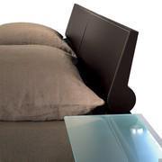 detail of the comma shaped headboard cushion - the positioning of the glass shelf will not be as in this picture