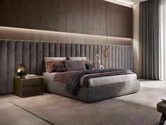 Lounge fabric boiserie in the 130 cm high version, with optional matching sommier bed