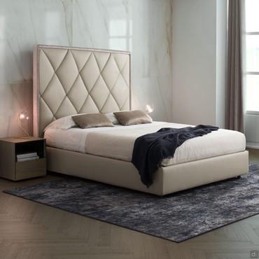 Olivier double bed with tall quilted headboard