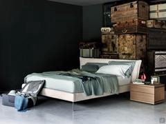 Panama textile bed with upholstered headboard, here proposed in the version with bed frame h.15,5 cm