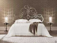 Pascià luxury bed by Cantori with important wrought iron headboard with silver leaf surface workmanship