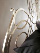 Detail of the oriental-style headboard of Cantori's Pascià bed