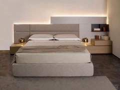 Freeport bed complete with flat upholstered Textile headboard panels. Smack fabric cover