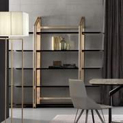 Steel frame, Pearl Gold finish, for a precious bookcase with a strong visual impact