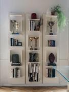 Fifty modular wall-mounted bookcase by Cattelan in white embossed lacquer and composed of three identical modules