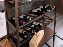 90 cm bottle rack, with space for 8 bottles. Made of metal and lacquered to match the uprights