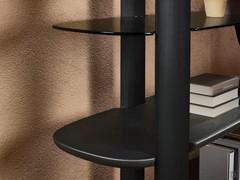 The structure of the Reef bookcase in its solid wood parts, as well as being worked with an elliptical cross-section, is characterised by shelves with a 'soapboard edge'.