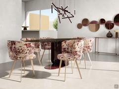 Living room chairs Petra quilted shell in floral fabric, with metal legs