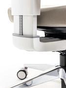 Detail of the height adjustment of the backrest so that it ergonomically adapts to the back of the person leaning on it