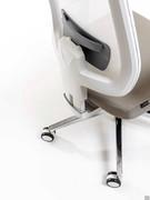 Detail of the mesh backrest with white plastic support frame and adjustable lumbar support in RAL 7047 grey plastic