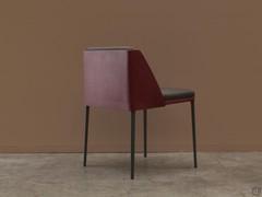 Detail of the full-grain leather backrest that folds down with two side wings and contains the upholstered seat