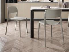 Sprint polypropylene chairs in Taupe (RAL 7035) finish, matching the Albert table in an open space context