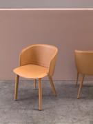Detail of the Kamet armchair upholstered and fully covered in belting leather available in many colours
