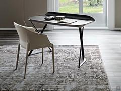 Zuleika armchair by Cattelan covered in leather, combined with Cocoon writing desk