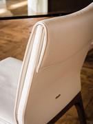 Detail of the backrest with upholstered cushion, a distinctive feature of Cattelan's Sofia chair