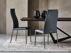 Norma chairs by Cattelan upholstered in leather, combined with Skorpio table