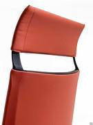 Detail of padded backrest with upholstered headrest for comfortable head support