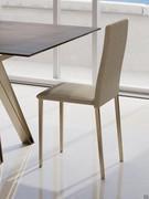 Letty chair upholstered in fabric, with metal frame in champagne finish